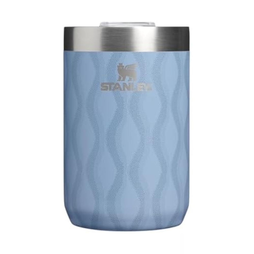 Light blue Stanley thermos with a textured wave pattern and stainless steel top.