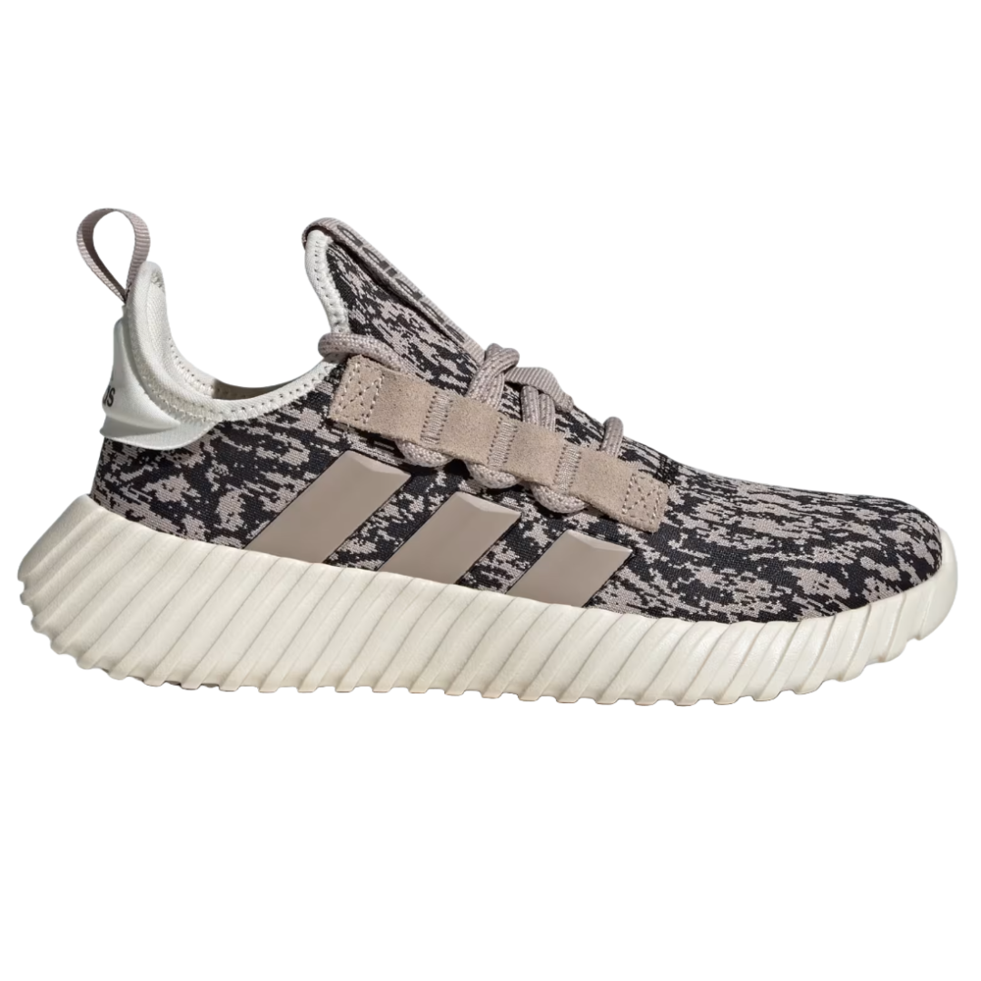 Adidas Women's Kaptir 3.0 Shoes feature a textured black and beige camo pattern with three beige stripes on the sides, a cushioned and ribbed sole, and a loop pull tab at the heel for easy wear.