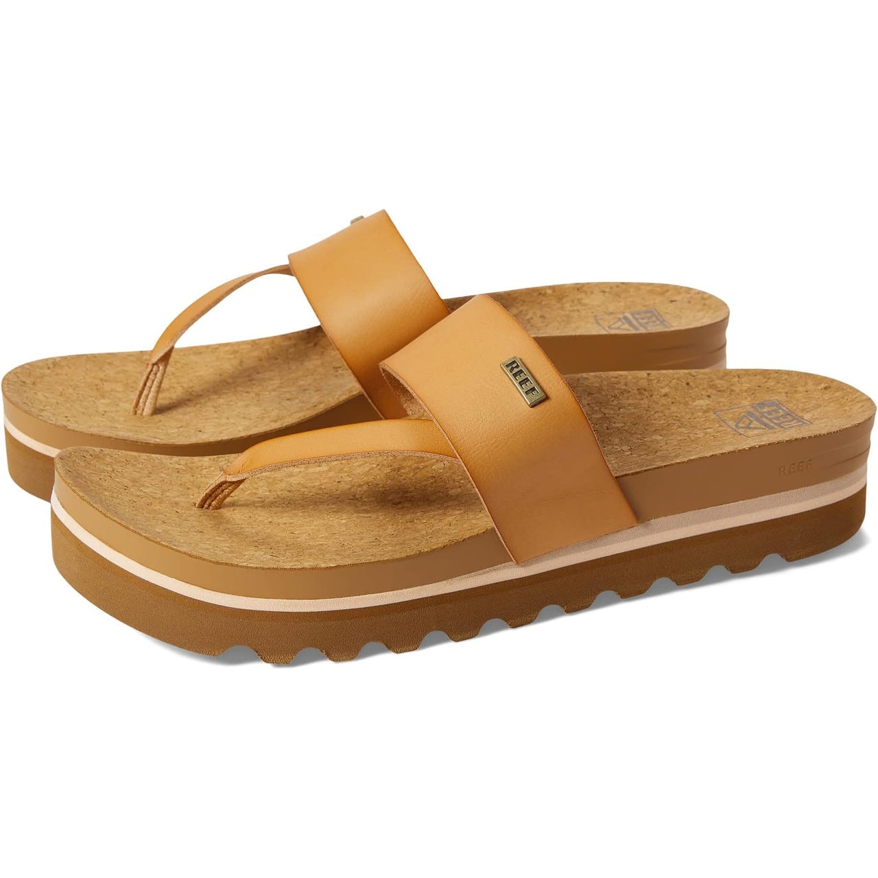 The Reef Cushion Sol Hi Sandals feature a tan leather upper with a wide strap and thong design, cork footbed, and platform sole with a textured bottom for grip.