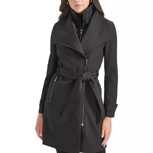 A black belted trench coat with an asymmetrical zipper front, wide collar, and zippered pockets.