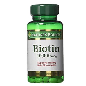 Nature's Bounty Biotin 10,000 mcg softgels, supporting hair, skin, and nail health.