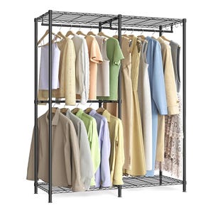 A freestanding metal wardrobe rack with two levels of clothes hanging space, displaying assorted garments on wooden hangers.