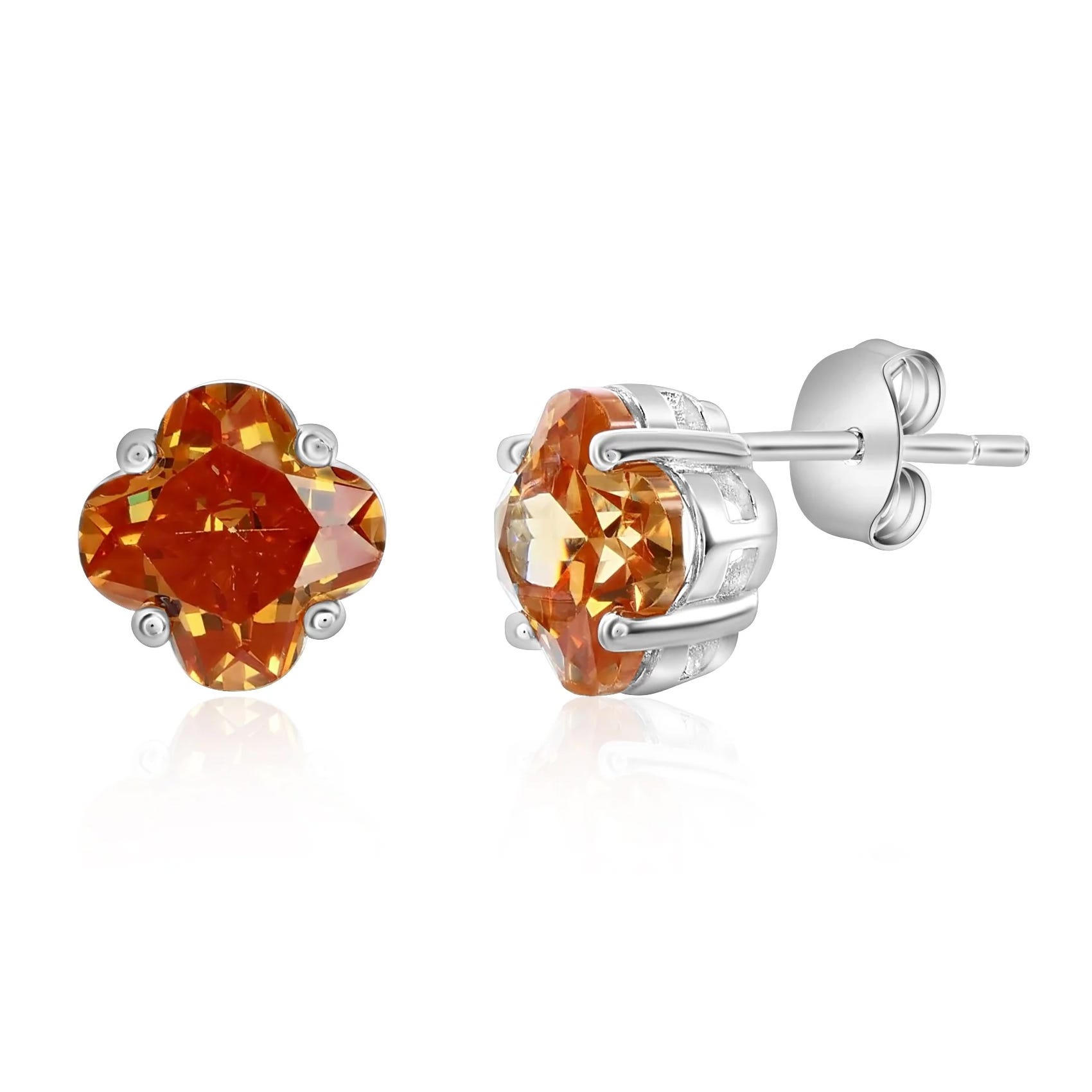 Pair of stud earrings featuring orange gemstone set in a silver prong setting with a secure post and butterfly back closure.