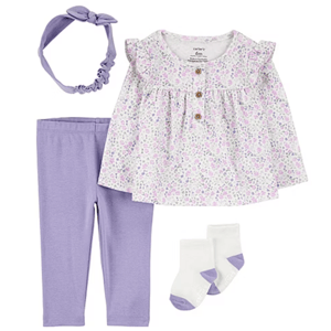 A baby girl outfit consisting of a floral long-sleeve top with ruffled shoulders and buttons, lavender leggings, a matching headband, and white socks with purple accents. Designed for 6 months old.