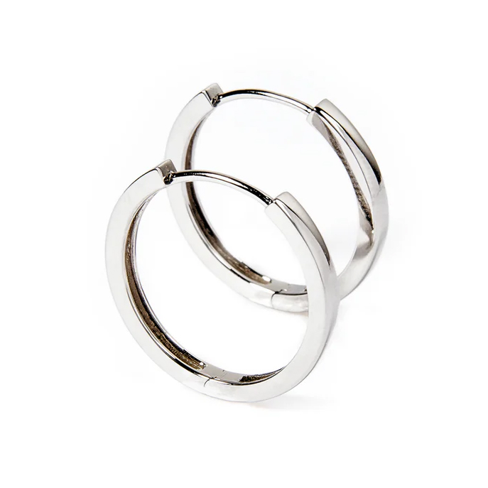 A pair of sleek silver hoop earrings with a polished finish, featuring a simple clasp closure for easy wear.
