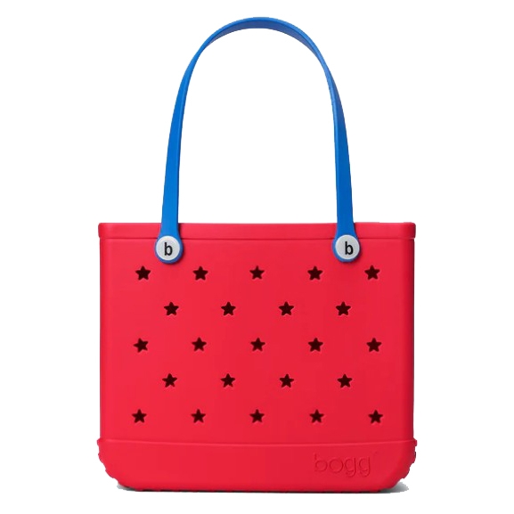 Red tote bag with blue handles, featuring star-shaped cutouts.