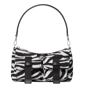 A zebra-patterned handbag with two front pockets and a detachable black strap.