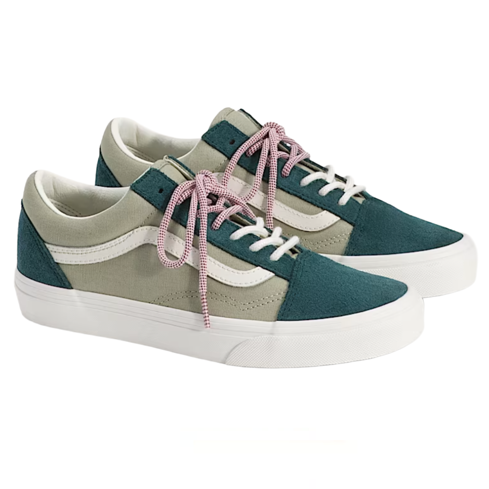 A pair of low-top sneakers featuring a teal and beige color scheme, enhanced with pink and white checkered laces and a white wavy stripe logo on the side.