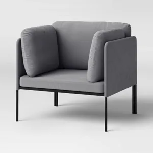 A modern gray armchair with a minimalist design, featuring cushioned sides and backrest on a slim black metal frame.