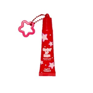 A red tube of Sweet Shimmer \“Glossy Lip Balm\“ in Strawberry Red, featuring star designs and a pink star-shaped keychain.