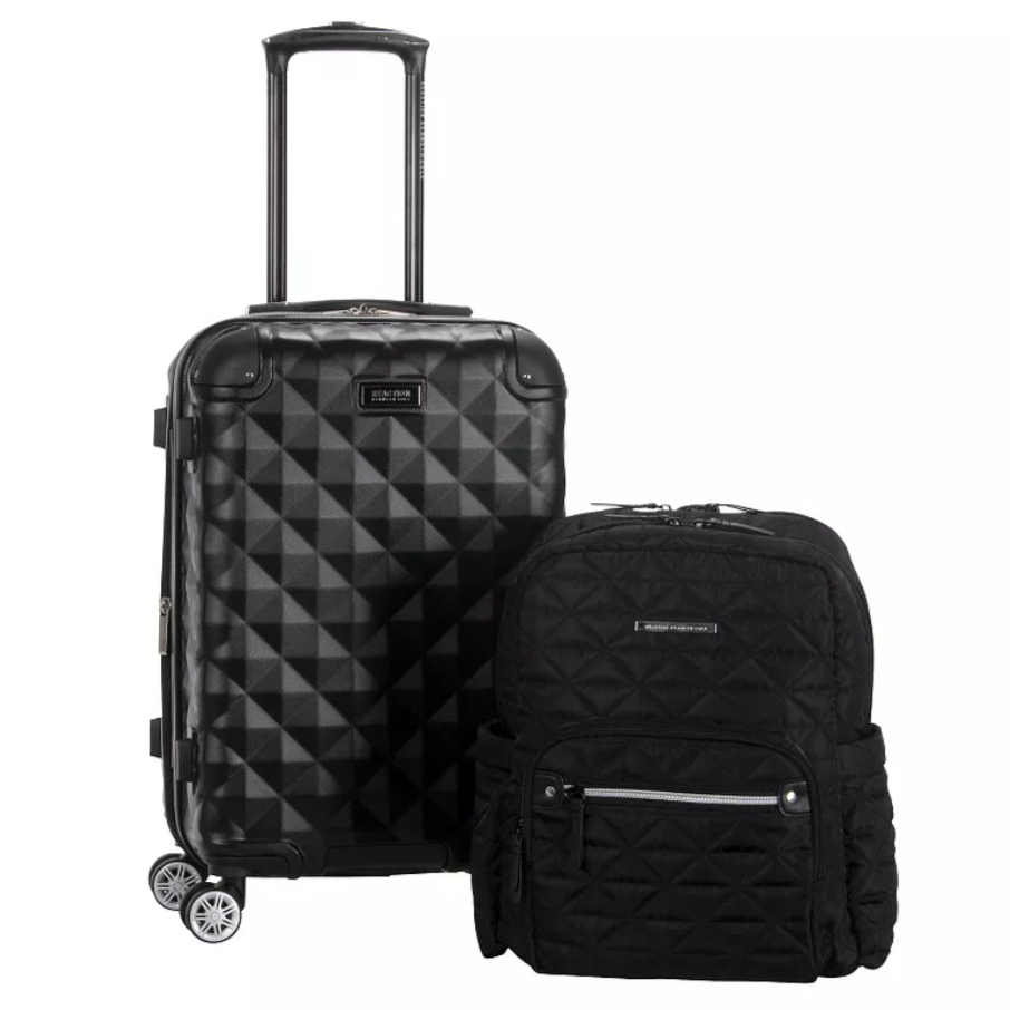 A black textured rolling suitcase with a diamond pattern and a quilted black backpack, both featuring zipper compartments and labeled patches.