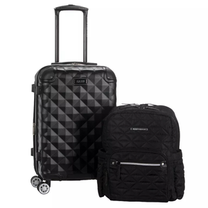 A black textured rolling suitcase with a diamond pattern and a quilted black backpack, both featuring zipper compartments and labeled patches.