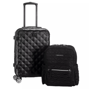 A black textured rolling suitcase with a diamond pattern and a quilted black backpack, both featuring zipper compartments and labeled patches.