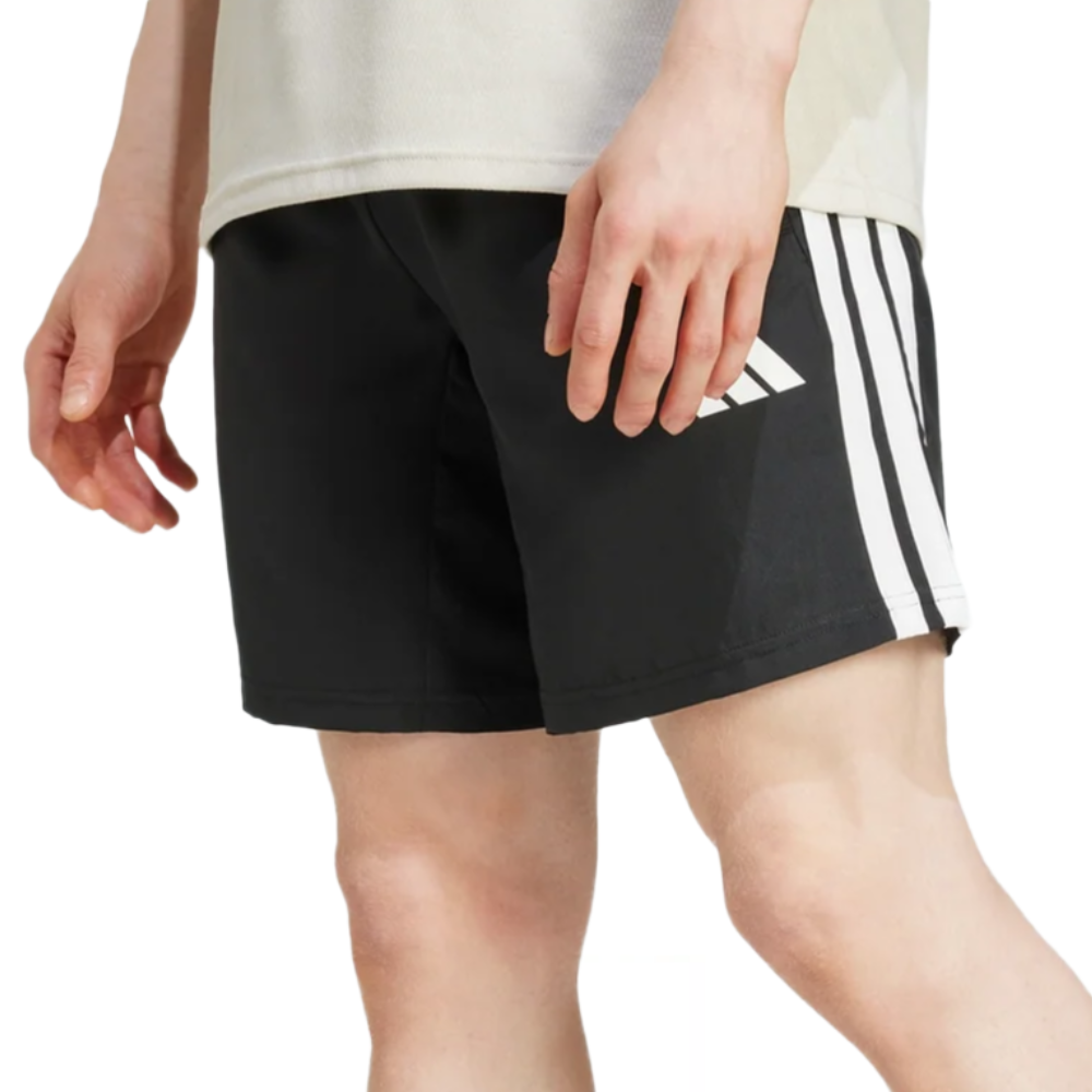 Black athletic shorts with white side stripes and a logo on the left leg.