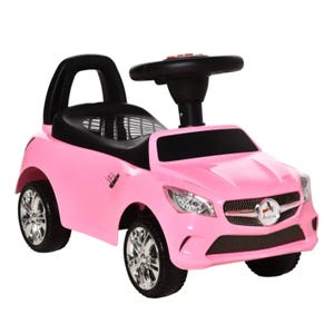 A pink toy ride-on car with a black seat and steering wheel, designed to resemble a modern car, featuring silver rims and a front grille emblem.