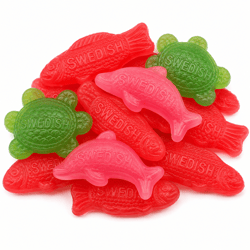 Chewy candy shaped like fish, a turtle, and a dolphin, labeled \“SWEDISH.\“ The candies are red, pink, and green.