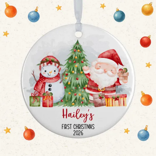 A round ornament featuring Santa, a snowman, and a Christmas tree, with \“Hailey's First Christmas 2026\“ written on it, surrounded by a festive background with stars and baubles.