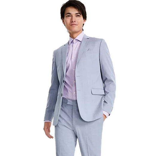 A man wearing a light blue suit with a lavender checkered shirt and a matching tie.