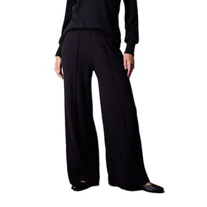 Black high-rise knit pants with a wide-leg design and a textured pattern, featuring a drawstring waist and side pockets.