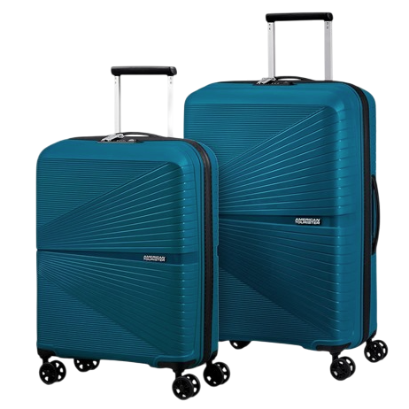 A set of two teal hard-shell suitcases with textured designs, each featuring four spinner wheels and a telescopic handle.