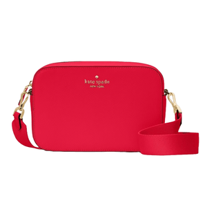 The Kate Spade Madison Camera Bag is a red rectangular crossbody bag with a zip closure, gold-tone hardware, and a detachable strap. It features the \“kate spade new york\“ logo on the front.