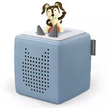 A blue Toniebox audio player with a dog figurine on top, used for playing audio content for children.