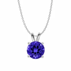 A necklace with a silver chain features a round, deep blue gemstone in a simple pendant setting.