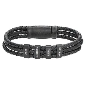A black braided leather bracelet featuring four adjustable metal rings with engraved names: Jess, Morgan, Lena, and Austin.