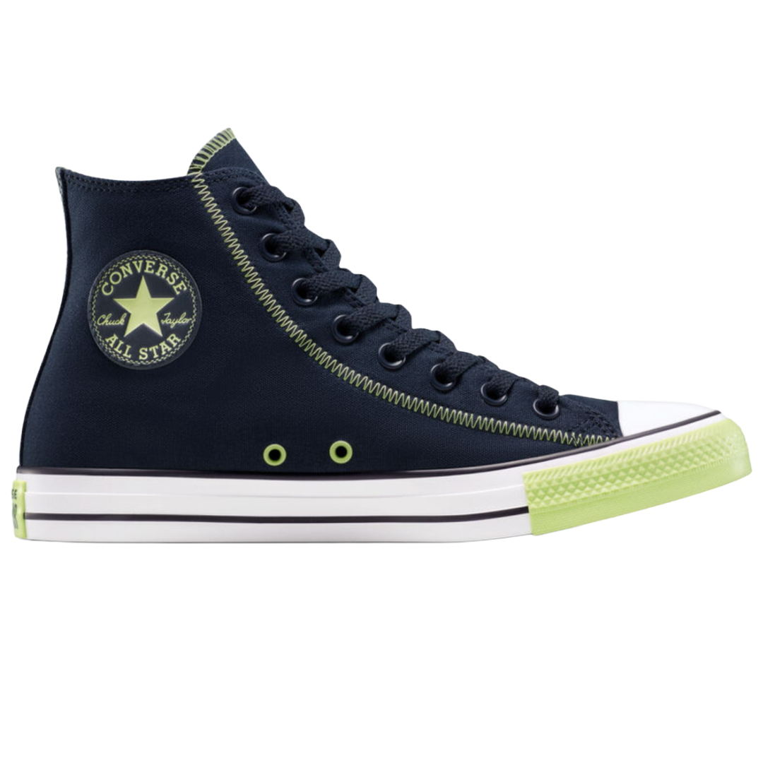 A navy blue Converse Chuck Taylor All Star high-top sneaker with lime green accents, including the side patch, eyelets, and toe cap stripe.