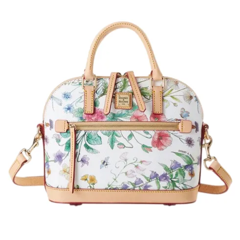 A floral-patterned handbag with tan leather accents, featuring dual handles, a detachable strap, and a front zip pocket.