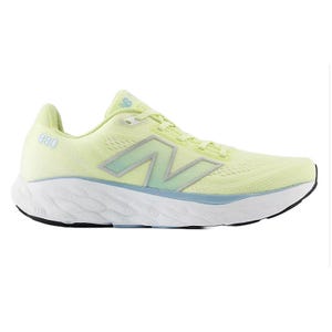 New Balance Fresh Foam X 880 Shoes are light yellow running shoes with a cushioned white and black sole, featuring the iconic \“N\“ logo in light blue and \“880\“ on the side. Designed for comfort and performance.