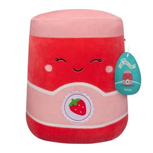 This is a plush stool designed to look like a smiling strawberry with a cute face and a name tag reading \“Janna.\“