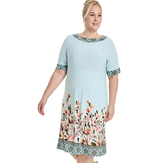 A light blue dress featuring floral designs at the hem and geometric patterns on the neckline and sleeves.