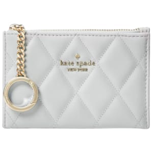 A quilted leather cardholder with a zip closure, gold chain, and keyring, featuring the Kate Spade New York logo in gold.