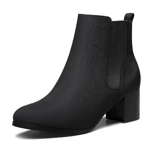 A black ankle boot with a block heel and elastic side panels, featuring a minimalist and sleek design.