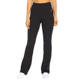 Black high-waisted yoga pants with a slight flare at the bottom, worn with white sneakers.
