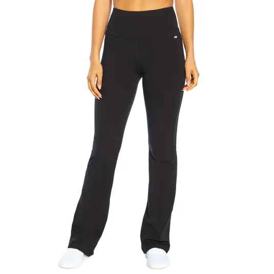 Black high-waisted yoga pants with a slight flare at the bottom, worn with white sneakers.