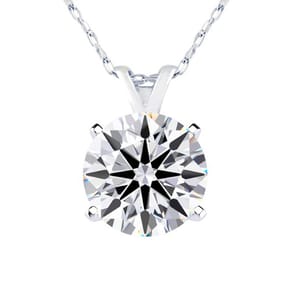 A 1.5-carat lab-grown diamond necklace featuring a round-cut diamond set in a four-prong setting on a delicate chain. The pendant has a classic and elegant design.