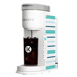 A Keurig coffee maker designed for brewing iced coffee, featuring a white and teal striped pattern.
