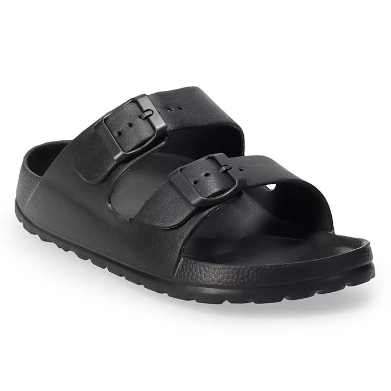 Black slip-on sandal with dual adjustable buckles and a textured sole.