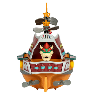 A toy airship resembling Bowser's ship from the Mario franchise, featuring a Bowser face on the front, propellers on top and sides, and detailed design elements.