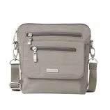 Gray crossbody bag with two front zippered pockets, adjustable strap, and metal hardware accents.