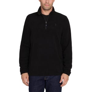 A man is wearing a black Izod pullover fleece with a half-zip closure and a subtle logo on the left chest. He's paired it with dark blue jeans.
