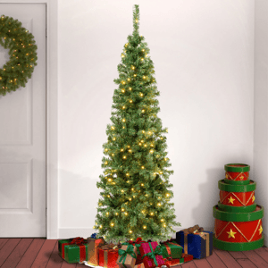Pre-lit pencil Christmas tree with lights, surrounded by wrapped gifts and decorative star-embellished boxes, accompanied by a matching wreath on the door.
