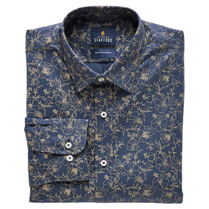 A folded long-sleeve shirt with a blue base and an intricate floral pattern in light colors.