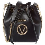 Black bucket bag with gold chain straps and gold circular emblem on front.