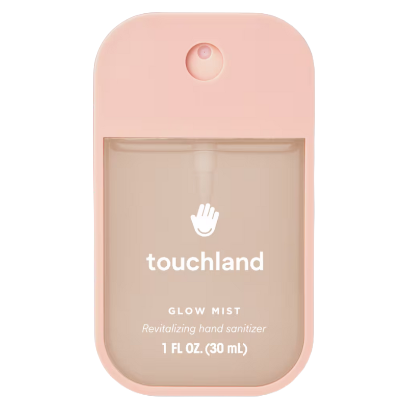 Touchland Glow Mist, a revitalizing hand sanitizer, 1 fl oz (30 mL), with a peach-pink casing.