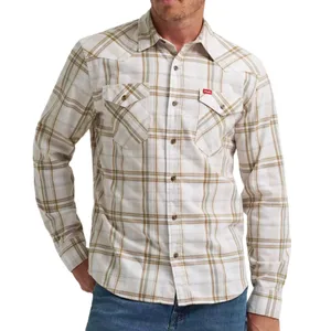 A plaid long-sleeve Western-style shirt with snap buttons and chest pockets, worn over jeans.