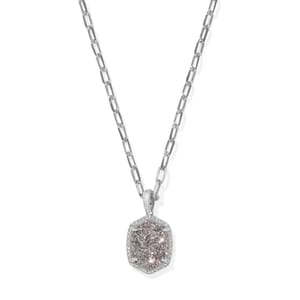 The Kendra Scott Daphne Necklace features a silver chain with an elongated link design and a hexagonal pendant adorned with clustered crystals, providing a subtle yet elegant sparkle.