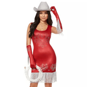 A woman is wearing a red dress with silver patterns, long red gloves with fringe, and a silver cowboy hat, while holding a rope.